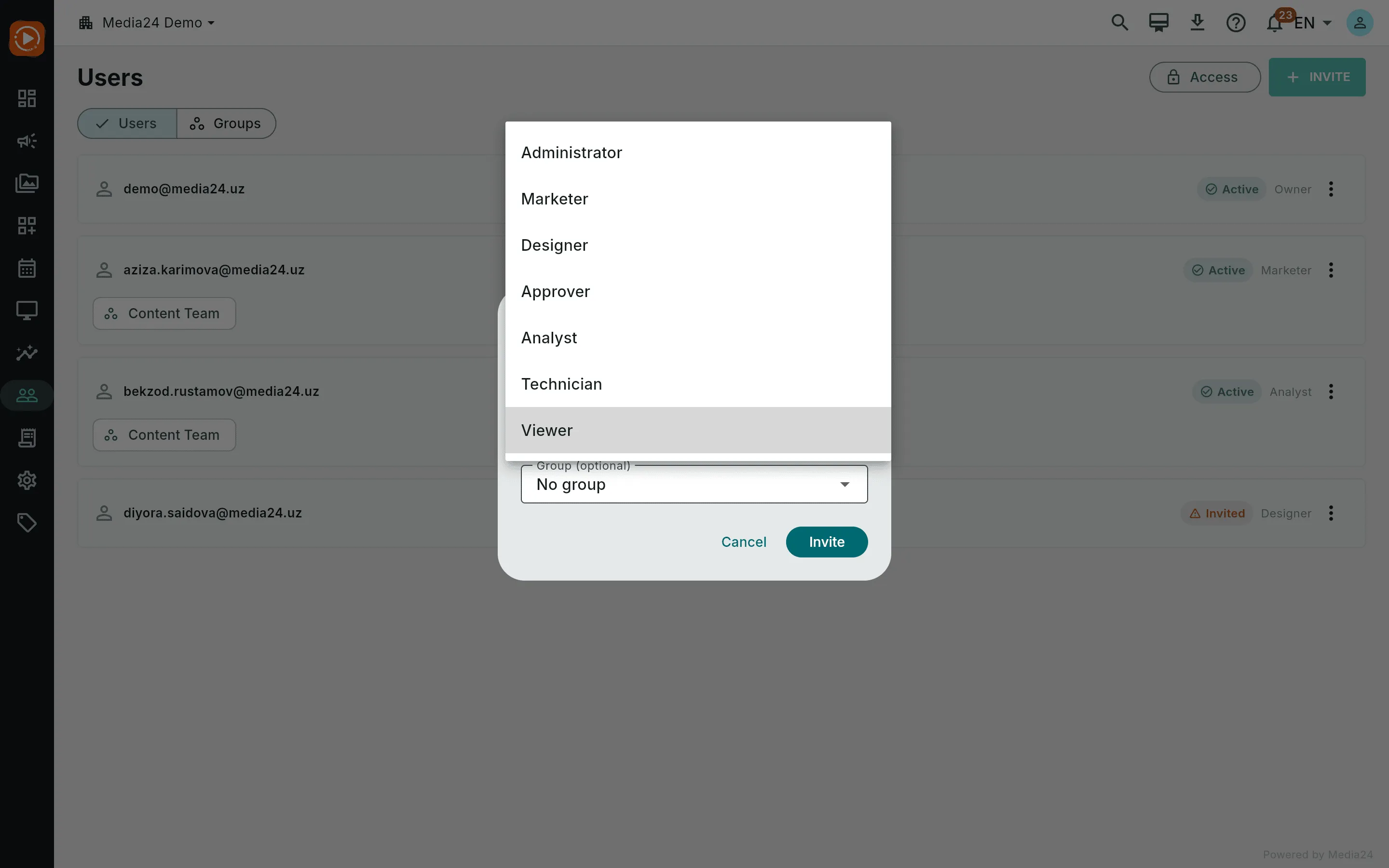 The invite dialog with an email typed and the role dropdown open, showing every role except Owner