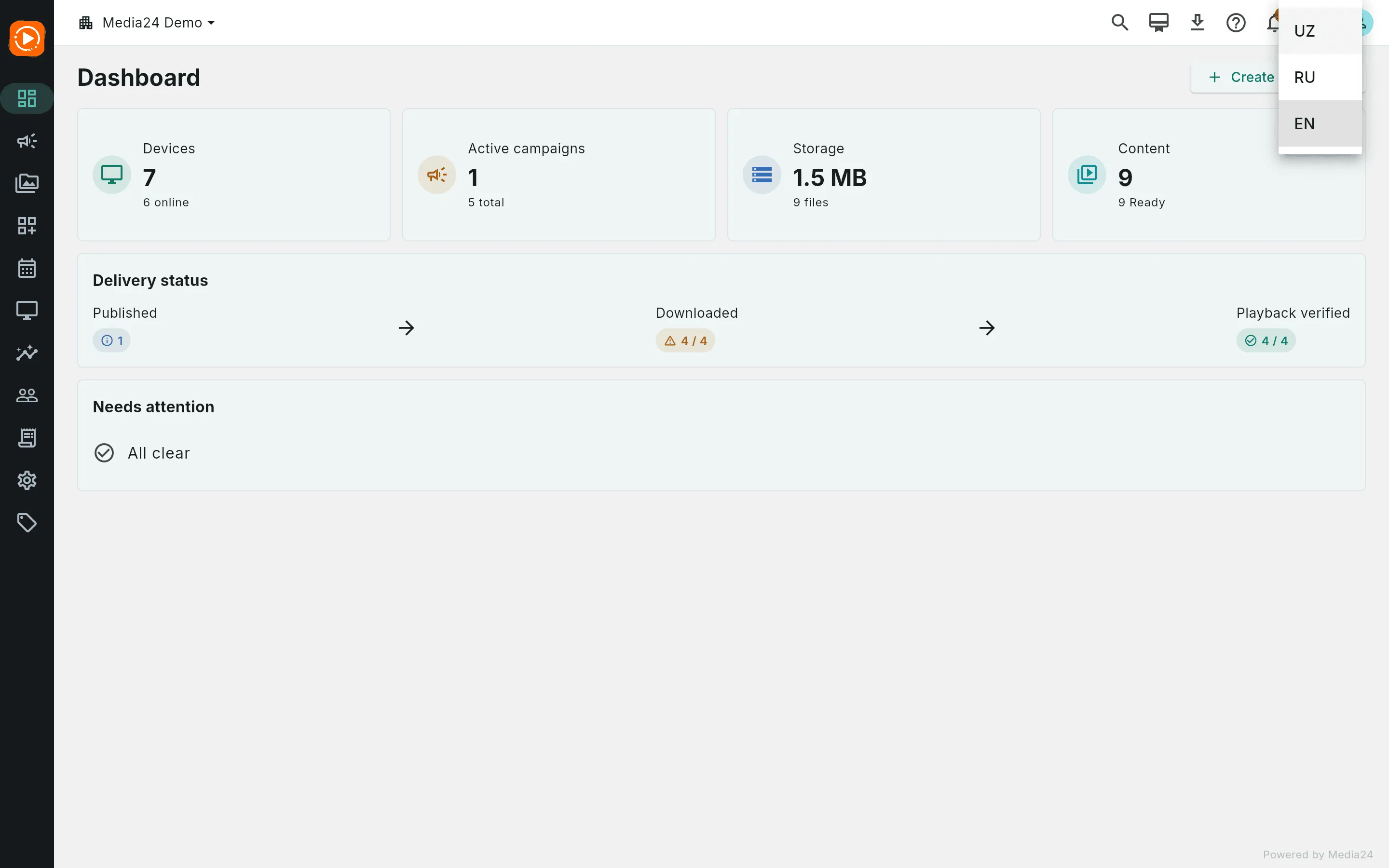 The language dropdown open, showing UZ, RU and EN options