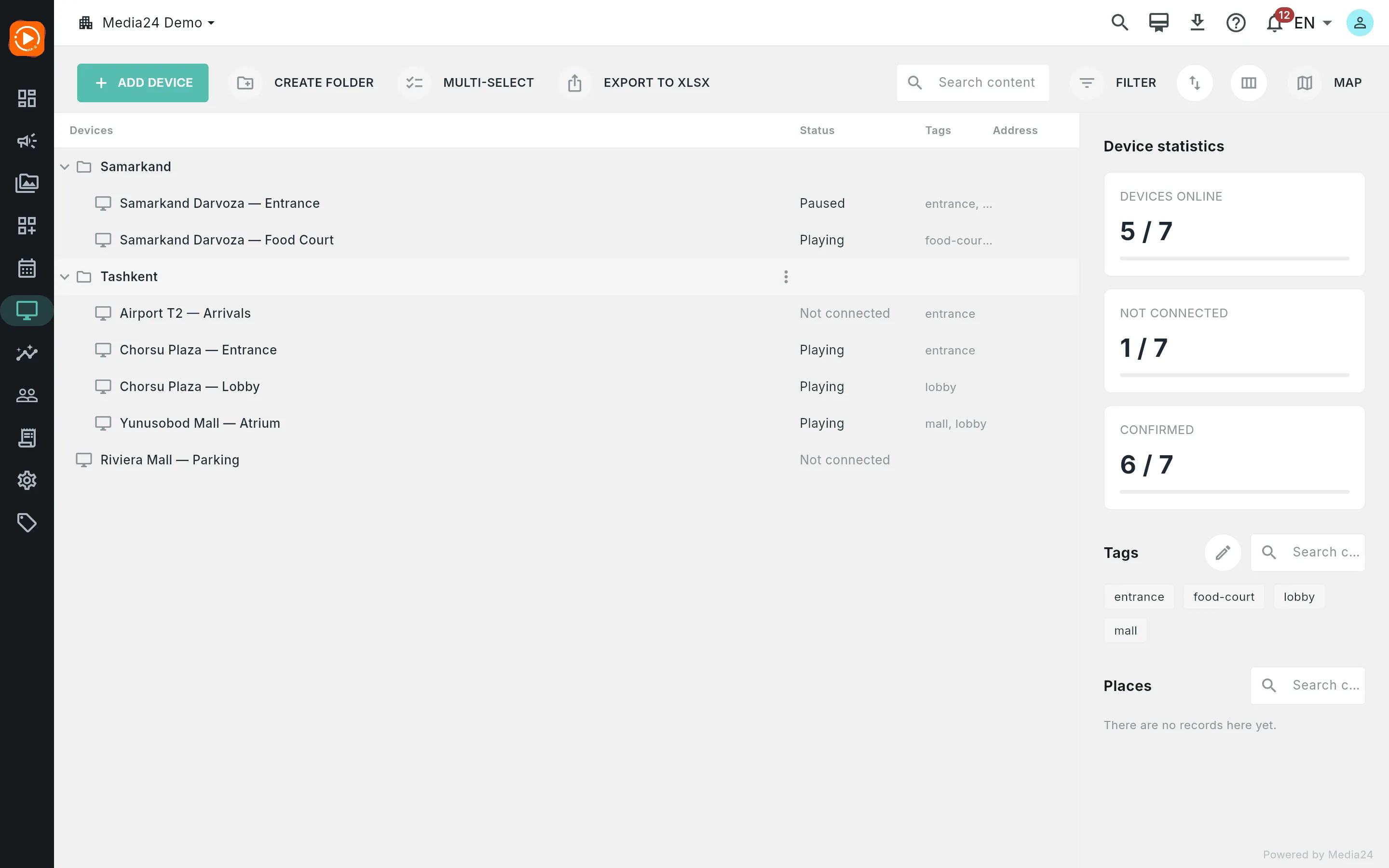 The Devices screen: two folders expanded with device rows, status/tags/address columns, and the right statistics sidebar